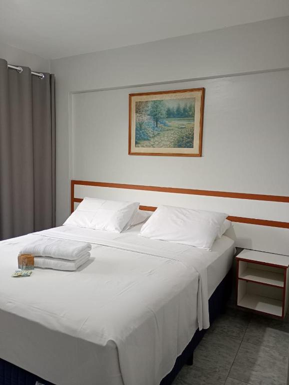 Postel nebo postele na pokoji v ubytování Gran hotel teatro