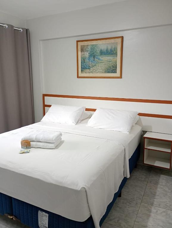 Postel nebo postele na pokoji v ubytování Gran hotel teatro