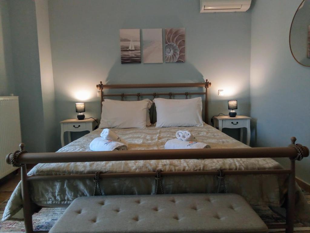Posteľ alebo postele v izbe v ubytovaní Nautilus Luxury Suites