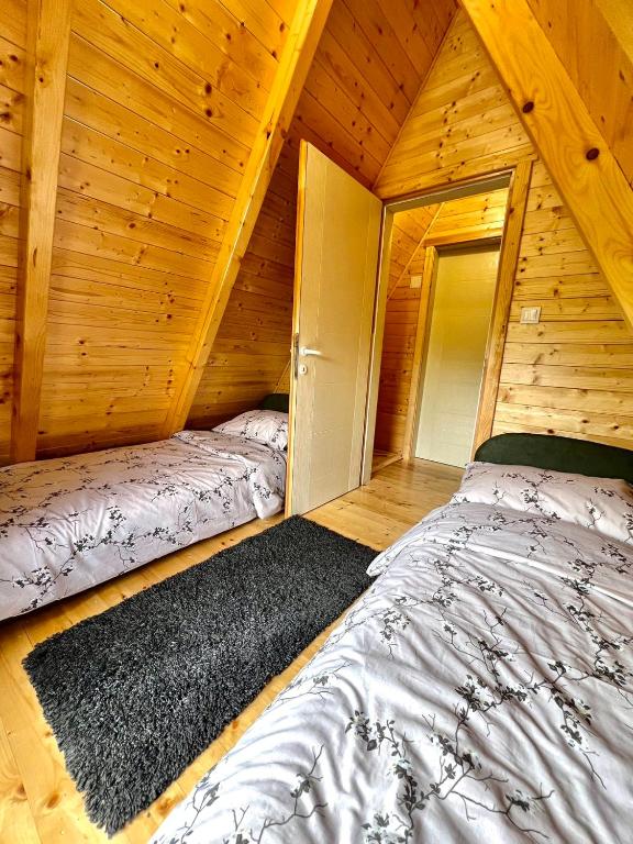 Postel nebo postele na pokoji v ubytování Vezirove zore