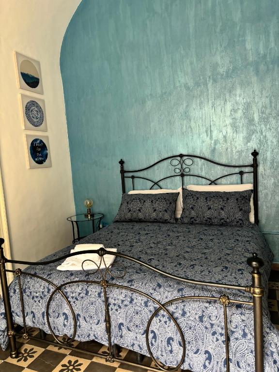 Posteľ alebo postele v izbe v ubytovaní Il Teatro Rooms