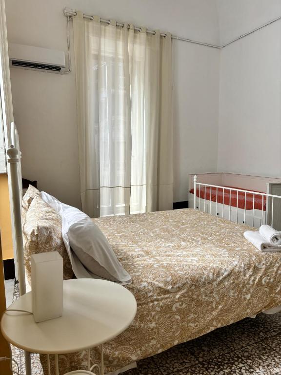 Posteľ alebo postele v izbe v ubytovaní Il Teatro Rooms