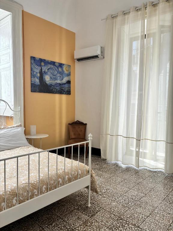 Posteľ alebo postele v izbe v ubytovaní Il Teatro Rooms