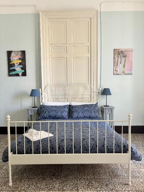 Posteľ alebo postele v izbe v ubytovaní Il Teatro Rooms