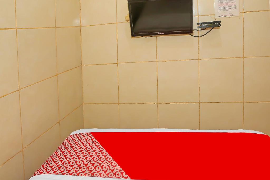 TV a/nebo společenská místnost v ubytování OYO 92678 Hotel Melati