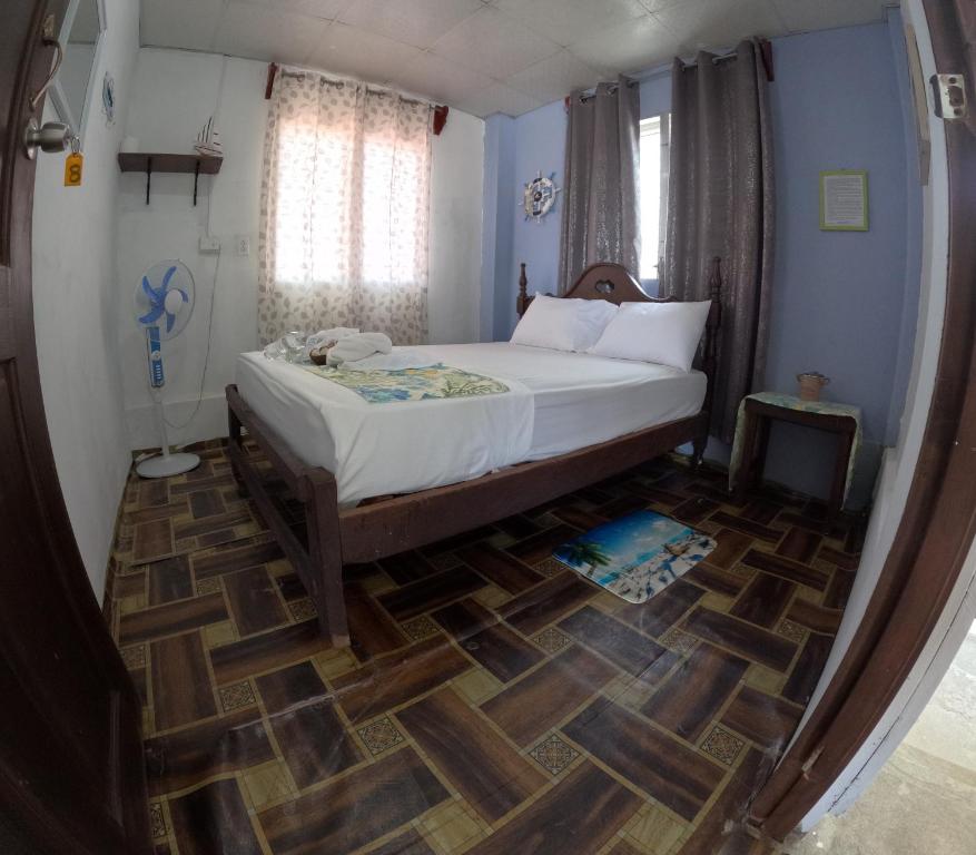 Postel nebo postele na pokoji v ubytování Hospedaje Yosi & Pixvae Tours