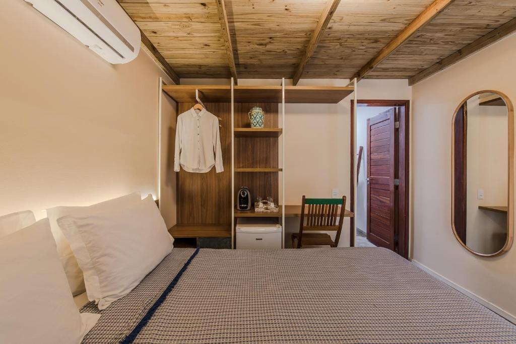 Postel nebo postele na pokoji v ubytování Vila Sal Noronha