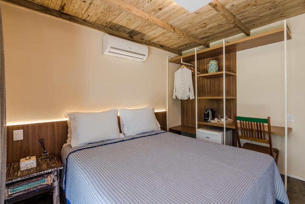 Postel nebo postele na pokoji v ubytování Vila Sal Noronha