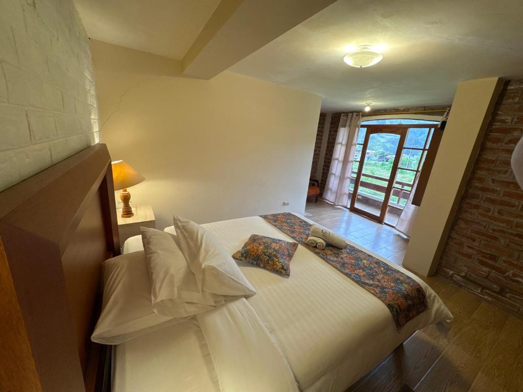 Postel nebo postele na pokoji v ubytování Spa Hotel Etelvina