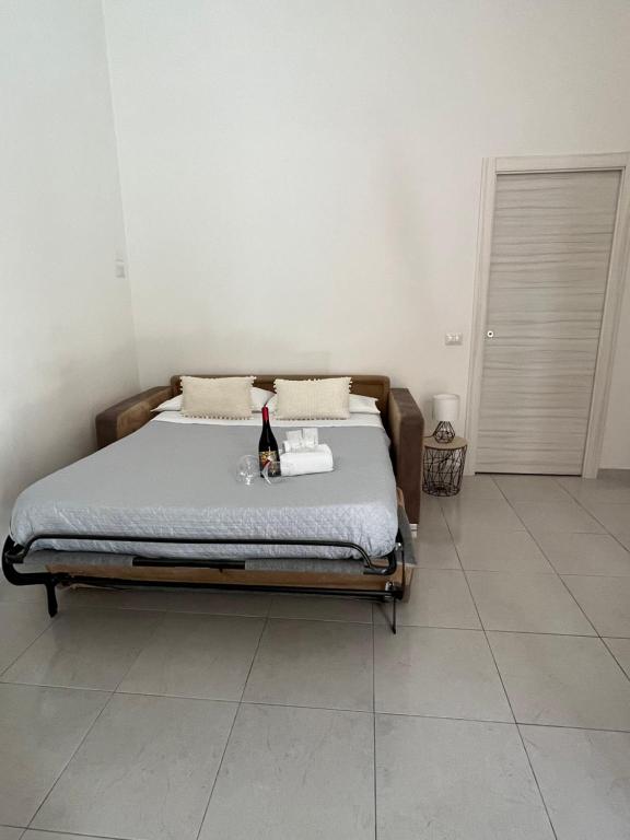 Łóżko lub łóżka w pokoju w obiekcie B&B Regina Rooms