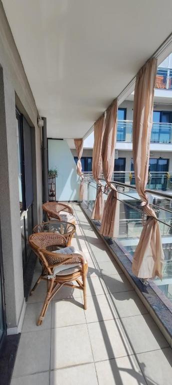 Balkón nebo terasa v ubytování Luxury Sea Sunset Deluxe Apartment