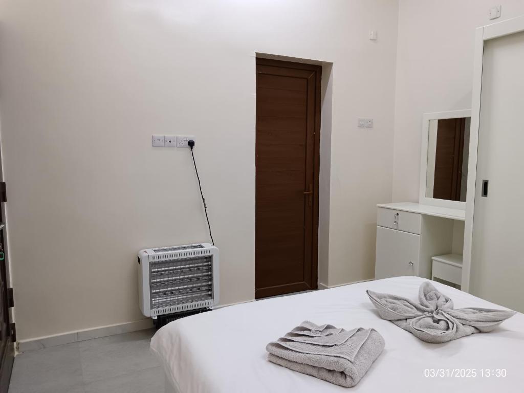 Voodi või voodid majutusasutuse HAWAKOM JABAL SHAMS REST house toas