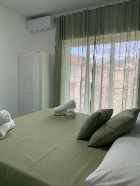 Postel nebo postele na pokoji v ubytování Ca Dó Sorrento Sensations