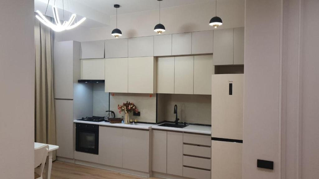 Køkken eller tekøkken på Комфорт и Уют