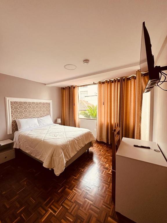 Postel nebo postele na pokoji v ubytování Hotel La Cartuja