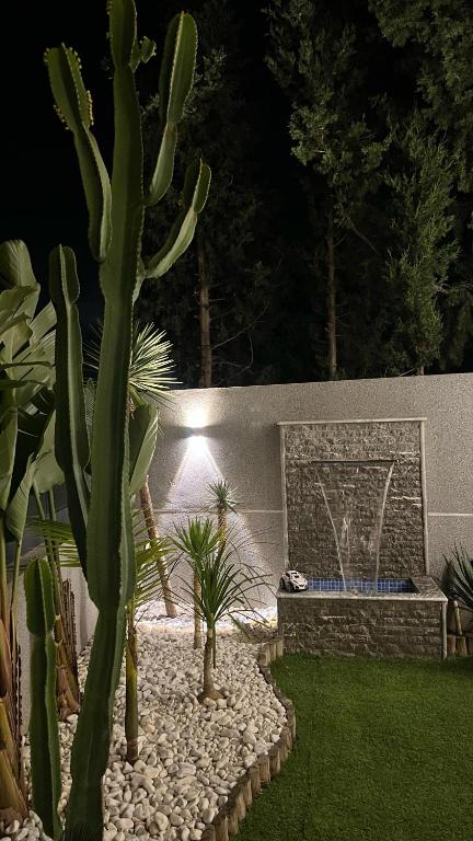 Κήπος έξω από το Villa Perle mémorable séjour vous attendent