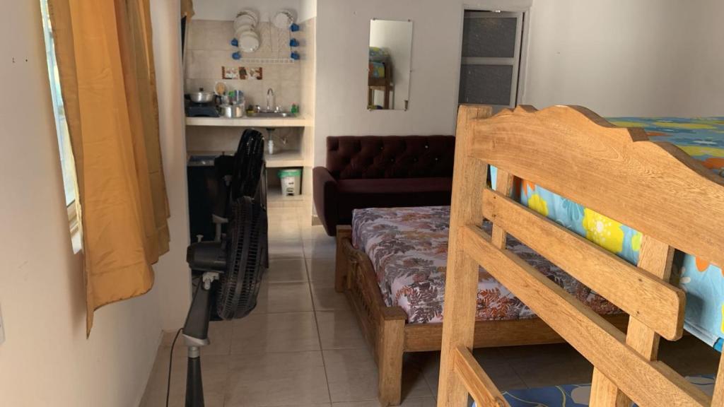 Ένα ή περισσότερα κρεβάτια σε δωμάτιο στο Hostal La FLora