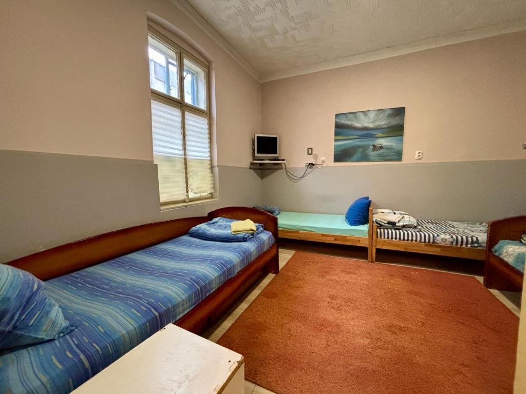 Postel nebo postele na pokoji v ubytování Vracar Affordable Suites - Vracar Povoljni Stanovi