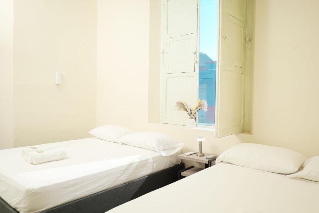 Postel nebo postele na pokoji v ubytování Casa Comala