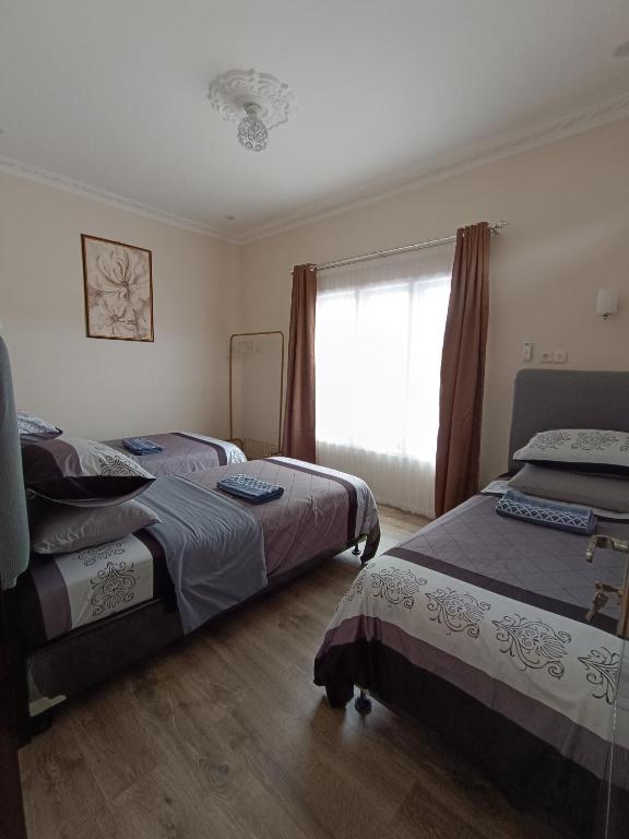 Postel nebo postele na pokoji v ubytování Dacha