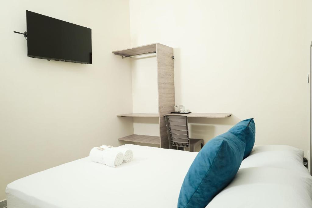 Postel nebo postele na pokoji v ubytování Casa Comala