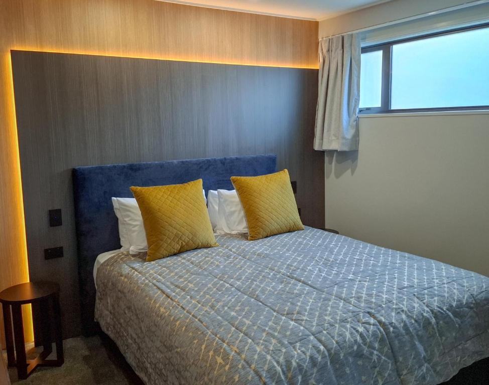 Postel nebo postele na pokoji v ubytování Distinction Coachman Hotel, Palmerston North