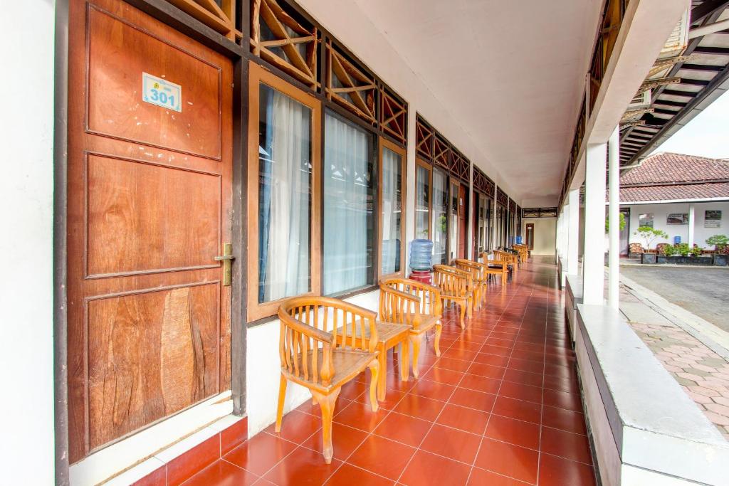 Balkón nebo terasa v ubytování Capital O 93024 Hotel Ganesha