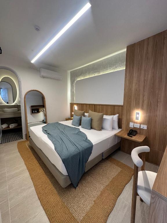 Postel nebo postele na pokoji v ubytování Casa Bugó Arsenal