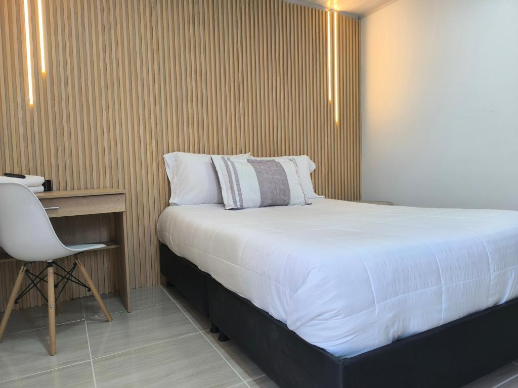 Postel nebo postele na pokoji v ubytování Hotel Cordi