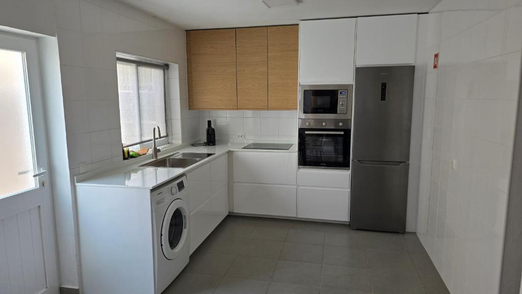 Kuchyň nebo kuchyňský kout v ubytování Santa Cruz Villas