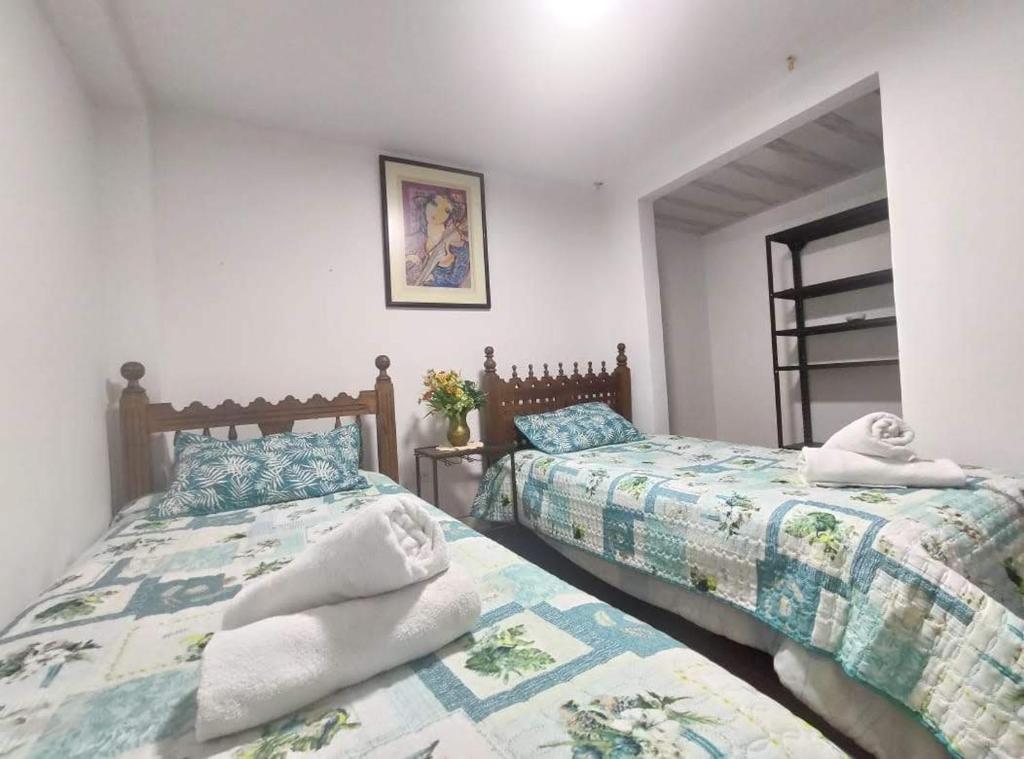 Postel nebo postele na pokoji v ubytování Vivienda Turística "El Coronel"