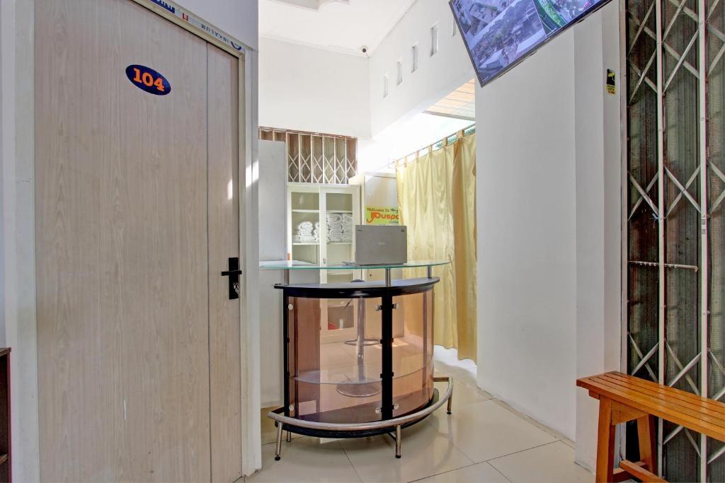 Kuchyň nebo kuchyňský kout v ubytování OYO 93095 New Puspa Residence