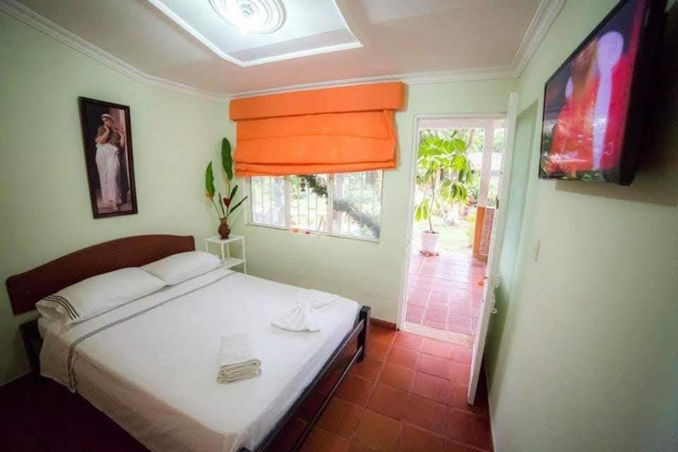 Postel nebo postele na pokoji v ubytování FiNCA TURISTICA LOS NARANJITOS