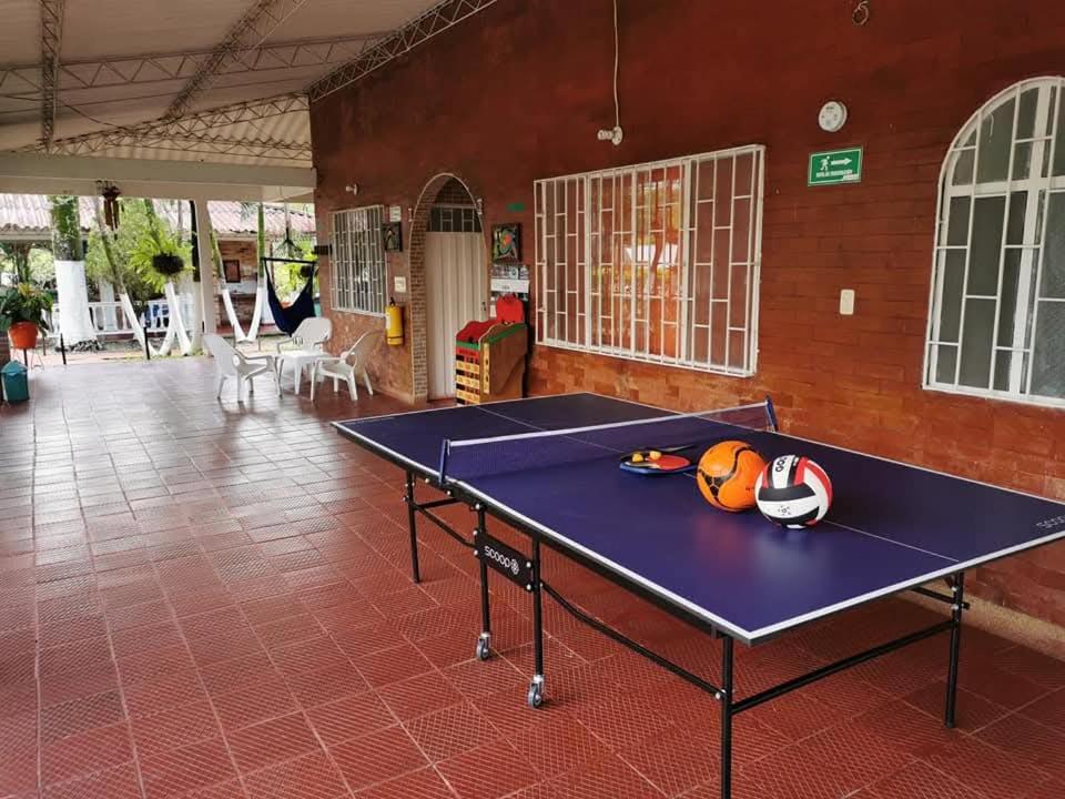 Stolní tenis v ubytování FiNCA TURISTICA LOS NARANJITOS nebo okolí