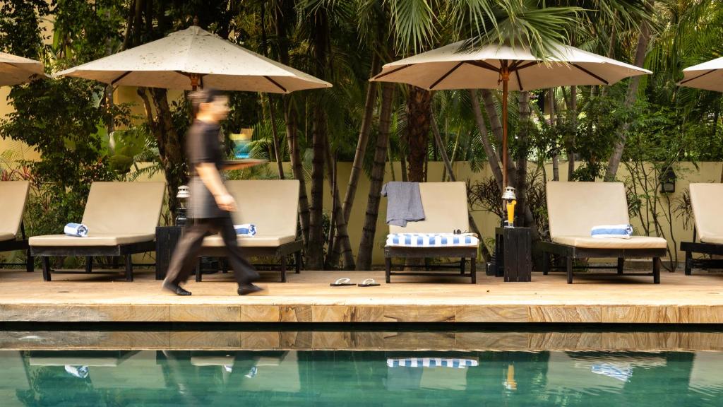 Bazén v ubytování Pavillon d'Orient Boutique Hotel nebo v jeho okolí