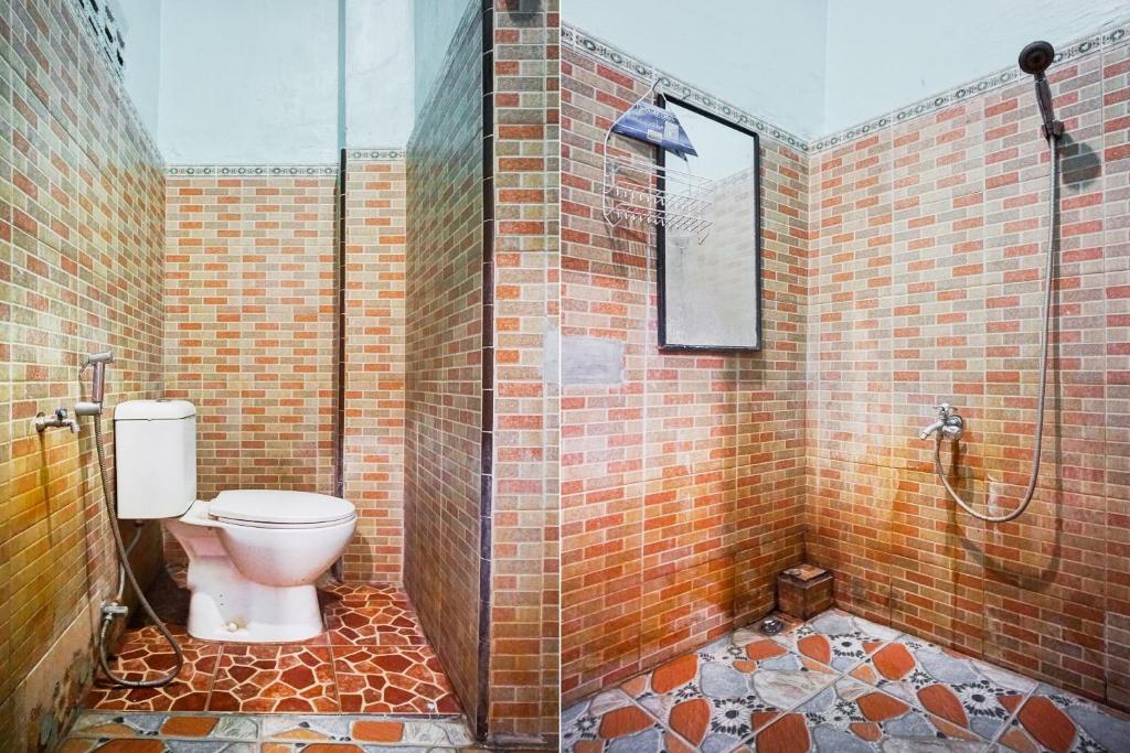 Koupelna v ubytování OYO 93071 Home Stay Kembar Syariah