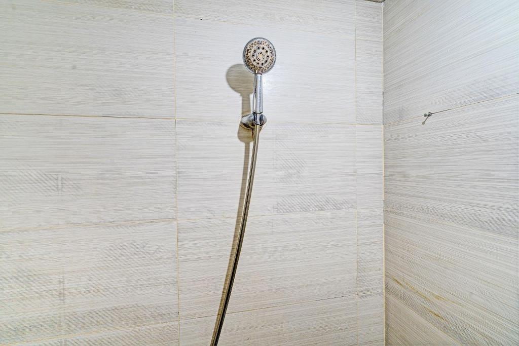 Koupelna v ubytování OYO Life 93065 Apartemen Gateway Pasteur By Glory Rent