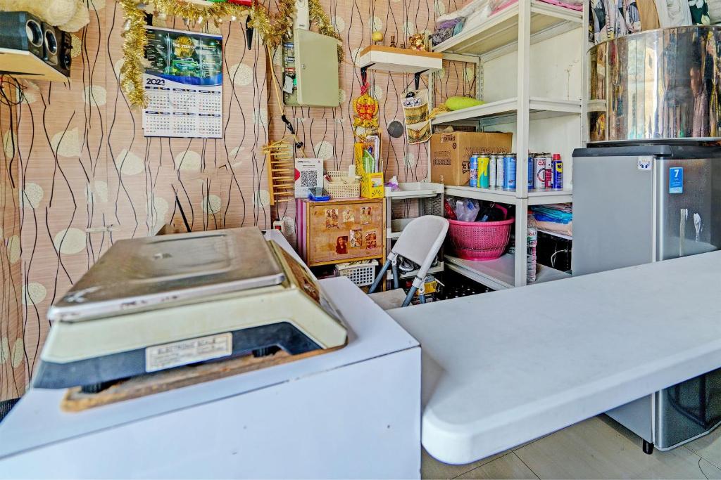 Kuchyň nebo kuchyňský kout v ubytování OYO Life 93065 Apartemen Gateway Pasteur By Glory Rent
