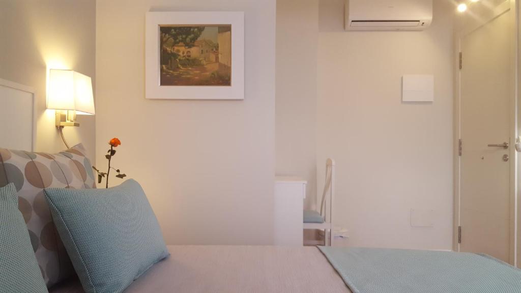 Postel nebo postele na pokoji v ubytování Hotel Creta Paguera