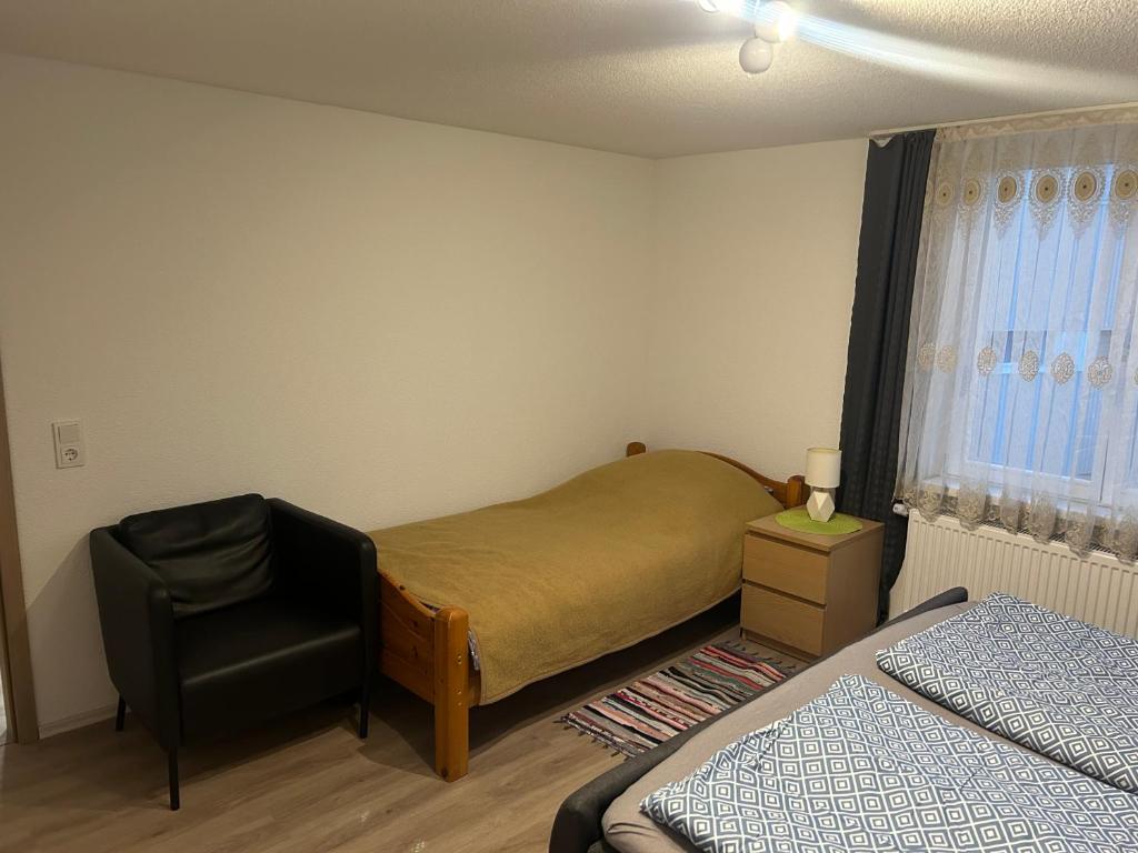 Postel nebo postele na pokoji v ubytování FERIENHAUS AyNa, direkt an der Schweizer Grenze