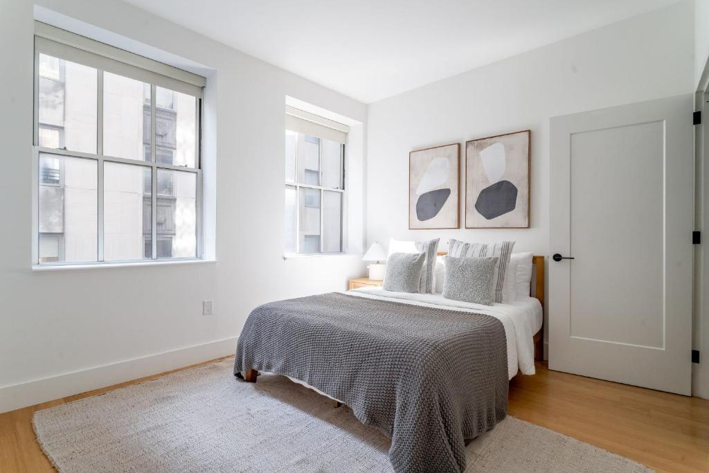 Postel nebo postele na pokoji v ubytování Stunning 2Bedroom 1Bath Apartment in the FiDi