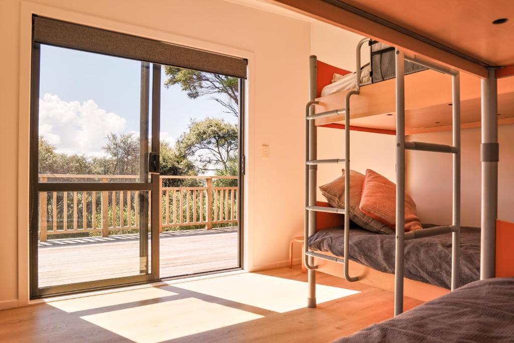 Postel nebo postele na pokoji v ubytování Tree House