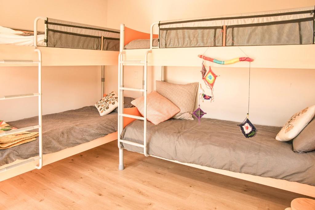 Postel nebo postele na pokoji v ubytování Tree House