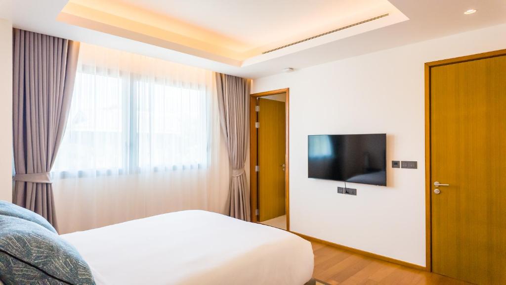 TV a/nebo společenská místnost v ubytování Angsana Ocean Pearl - Laguna Seaview Penthouse