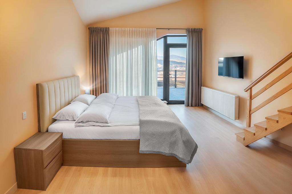 Postel nebo postele na pokoji v ubytování Terrace Akhaltsikhe