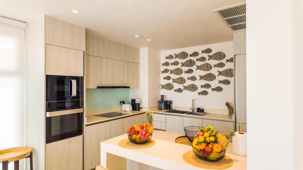 Kuchyň nebo kuchyňský kout v ubytování Angsana Ocean Pearl - Laguna Seaview Penthouse
