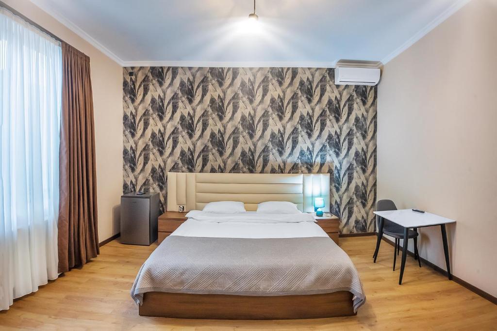 Postel nebo postele na pokoji v ubytování Terrace Akhaltsikhe