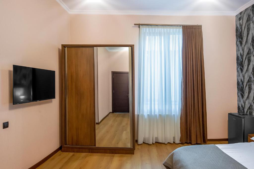 TV a/nebo společenská místnost v ubytování Terrace Akhaltsikhe