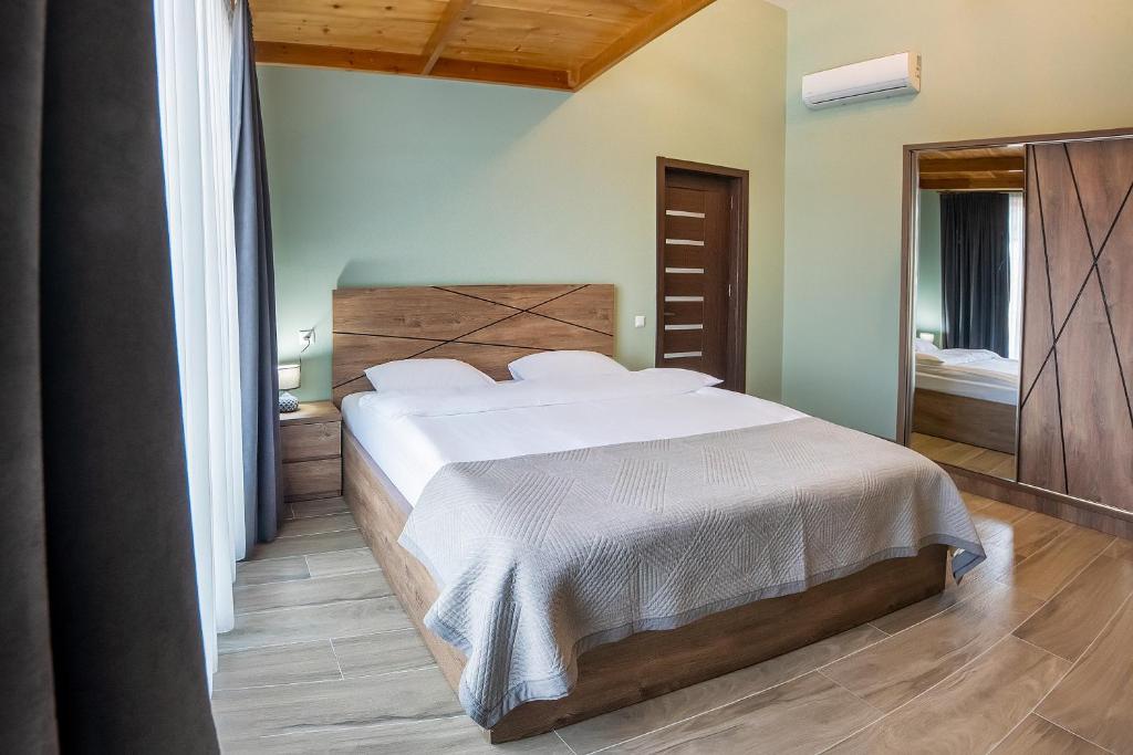 Postel nebo postele na pokoji v ubytování Terrace Akhaltsikhe