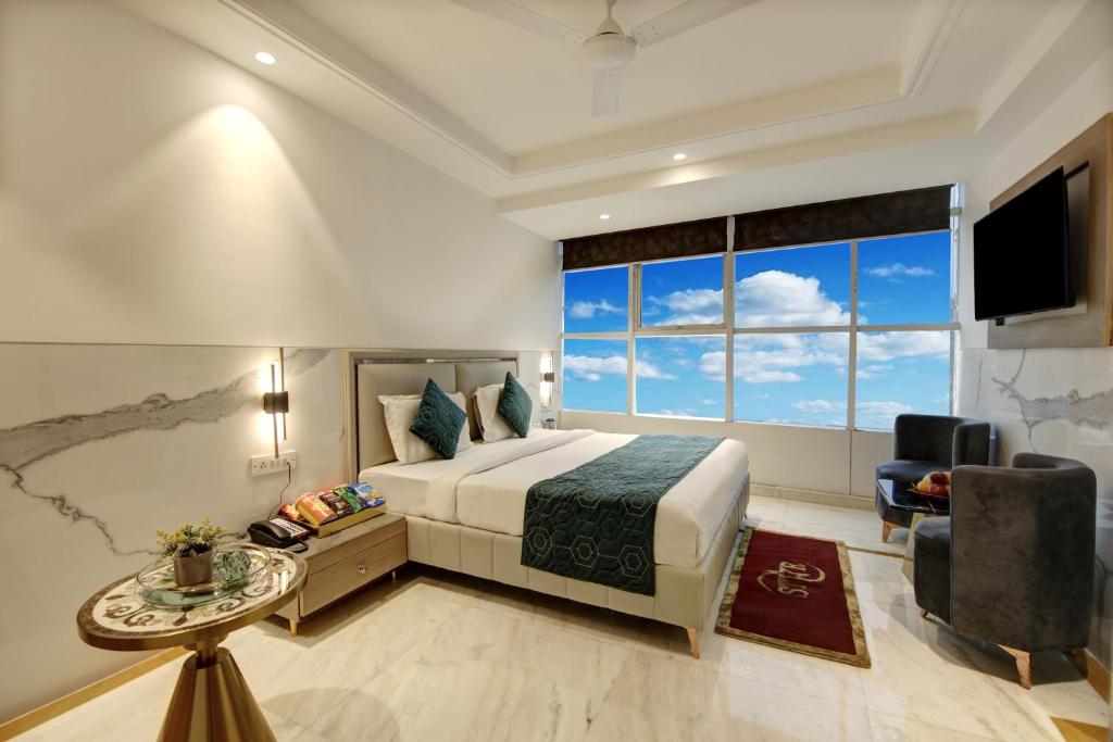 Katil atau katil-katil dalam bilik di Hotel International Inn by Star Group - Near Delhi Airport